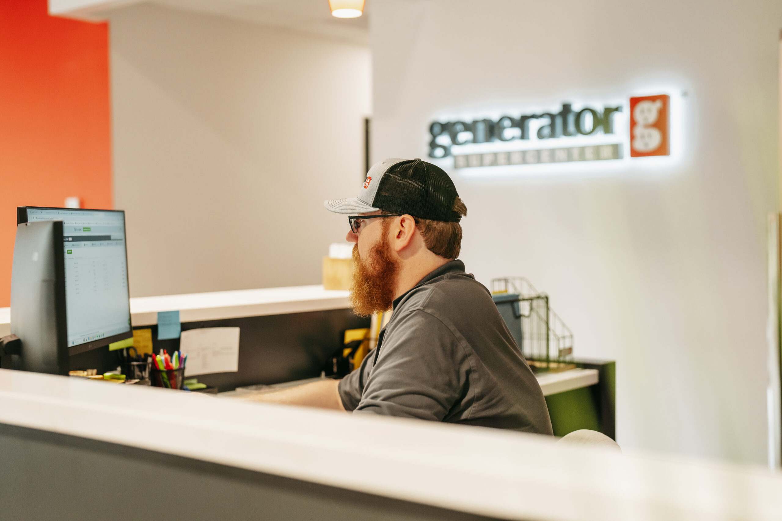 Generator Supercenter technician assisting a customer in the showroom